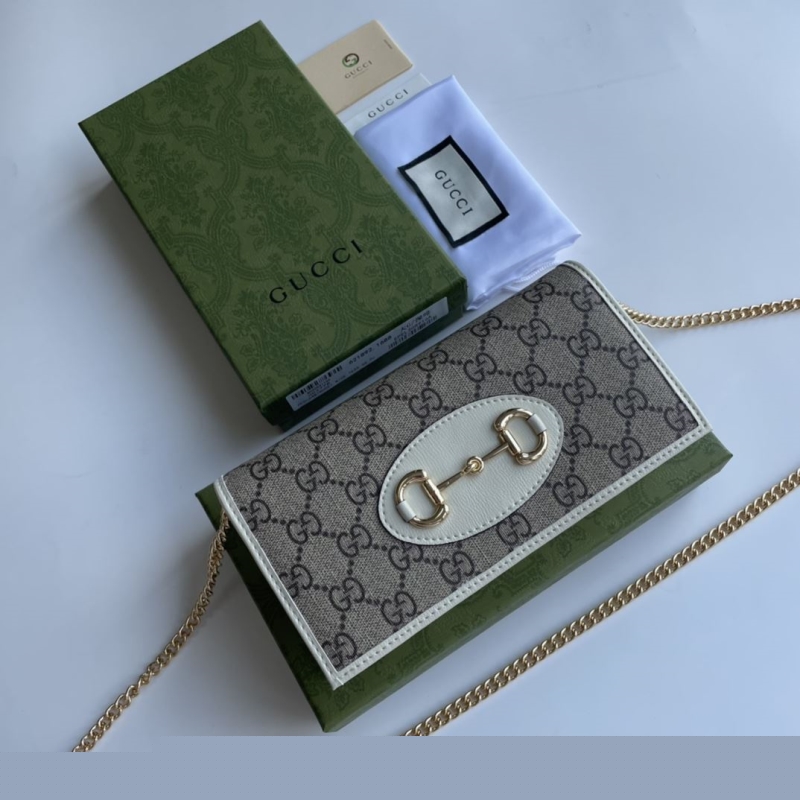 G*u*i satchel bags